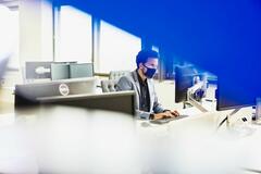 this is a man using the computer