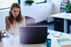 A woman working on a computer