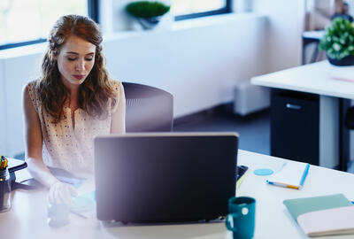 A woman working on a computer