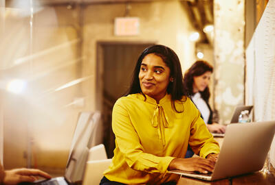 A woman smiling