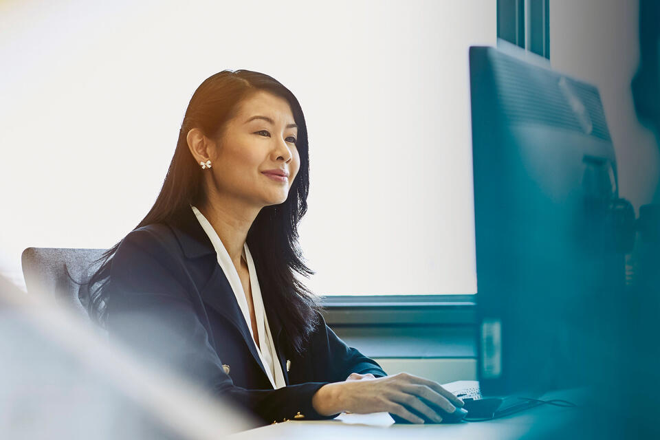 woman sitting on a desk